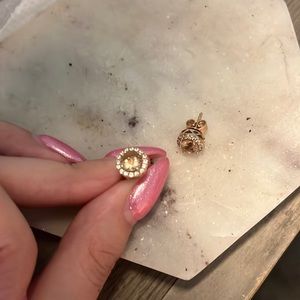 rose gold earrings with morganite center and diamonds around